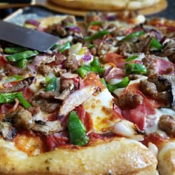 Pizza Hut - Medium Hand tossed Super Supreme pizza with garlic butter crust, no olives