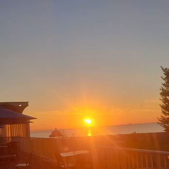 Illinois Beach Hotel - Sunrise from room 115. - Venues & Event Spaces Near Me - Zion, Illinois Illinois Beach Hotel - Sunrise from room 115. - Venues & Event Spaces Near Me - Zion, Illinois