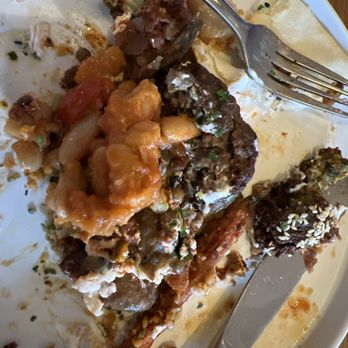 Zhug - All the left overs from other people at our table that I did not want to get wasted. So I put them in my plate and ate them. - Mediterranean Near Me - Cleveland Heights, Ohio Zhug - All the left overs from other people at our table that I did not want to get wasted. So I put them in my plate and ate them. - Mediterranean Near Me - Cleveland Heights, Ohio