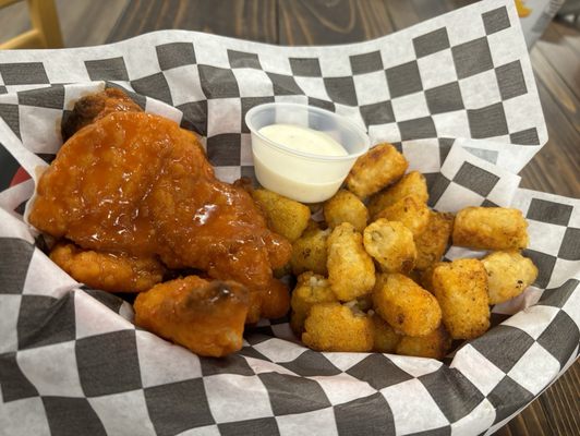 Photo of Zulu's Board Game Cafe - Lynnwood, WA, US. Chicken strips and Tots