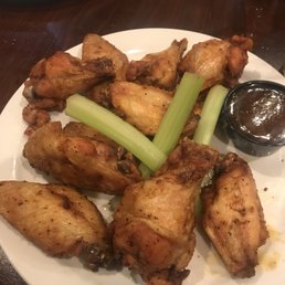 a plate of chicken wings and celery a plate of chicken wings and celery