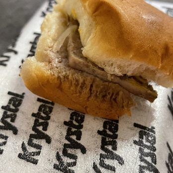 Krystal - a half eaten sandwich on a napkin - Burgers Near Me - Muscle Shoals, Alabama Krystal - a half eaten sandwich on a napkin - Burgers Near Me - Muscle Shoals, Alabama