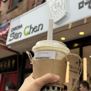 Chicha San Chen - a hand holding a cup of coffee - Bubble Tea Near Me - Philadelphia, Pennsylvania Chicha San Chen - a hand holding a cup of coffee - Bubble Tea Near Me - Philadelphia, Pennsylvania
