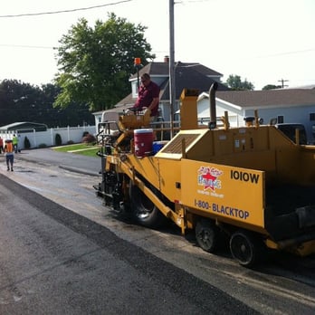 All Star Paving - workers working on a street - General Contractors Near Me - Seymour, Indiana All Star Paving - workers working on a street - General Contractors Near Me - Seymour, Indiana