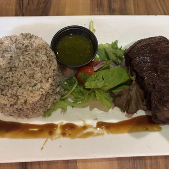 Chicharrón - Skirt steak with sausage rice - Puerto Rican Near Me - San Juan, Puerto Rico