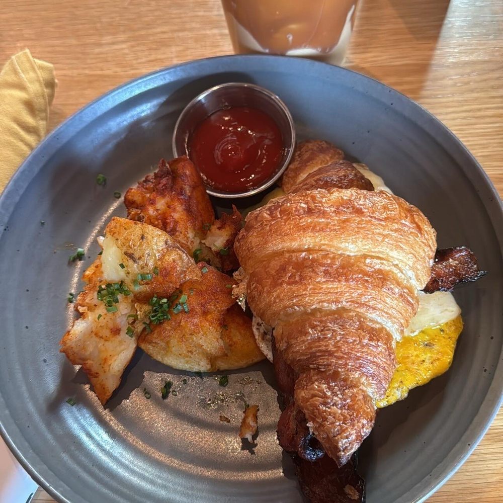 Salt Yard Cafe & Bar - Bacon egg and cheese croissant sandwich - New American Near Me - Portland, Maine Salt Yard Cafe & Bar - Bacon egg and cheese croissant sandwich - New American Near Me - Portland, Maine