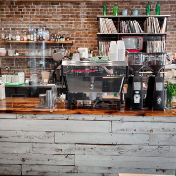 Paquebot - a brick wall and counter in a coffee shop - Coffee & Tea Near Me - Montreal, Quebec Paquebot - a brick wall and counter in a coffee shop - Coffee & Tea Near Me - Montreal, Quebec