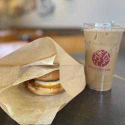 Sweetwaters Coffee & Tea - Vanilla oat latte with a BEC bagel.