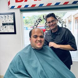 Great barber doing his magic on my Joseph!