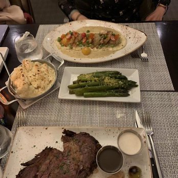 Jefferson's Restaurant & Bar - Slow roasted prime rib, sea scallops and shrimp dish. Cauliflower casserole and asparagus. - New American Near Me - Hot Springs, Virginia Jefferson's Restaurant & Bar - Slow roasted prime rib, sea scallops and shrimp dish. Cauliflower casserole and asparagus. - New American Near Me - Hot Springs, Virginia