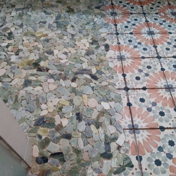 Magnolia Tile & Remodeling - Rock shower floor scribed into bathroom floor tile. - Cabinetry Near Me Magnolia Tile & Remodeling - Rock shower floor scribed into bathroom floor tile. - Cabinetry Near Me