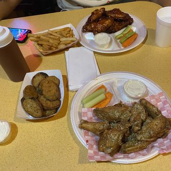 Long Wongs - Lemon pepper wings, fired zucchini, Cajun fries, honey barbecue wings - Burgers Near Me - Scottsdale, Arizona Long Wongs - Lemon pepper wings, fired zucchini, Cajun fries, honey barbecue wings - Burgers Near Me - Scottsdale, Arizona