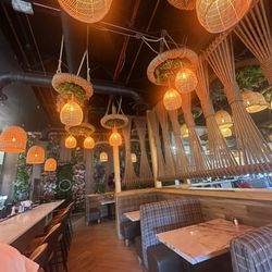 Hacienda Bar & Grill - The bar. Cool, lighting, ample space, comfortable chairs, and booths.