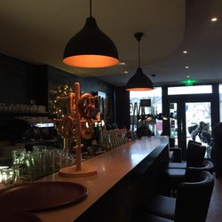 O2 - The counter, ambiance is cosy with cool music. Good place for a wine stop