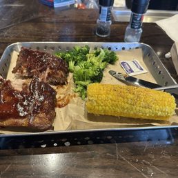 1/2 rack of ribs with broccoli and corn