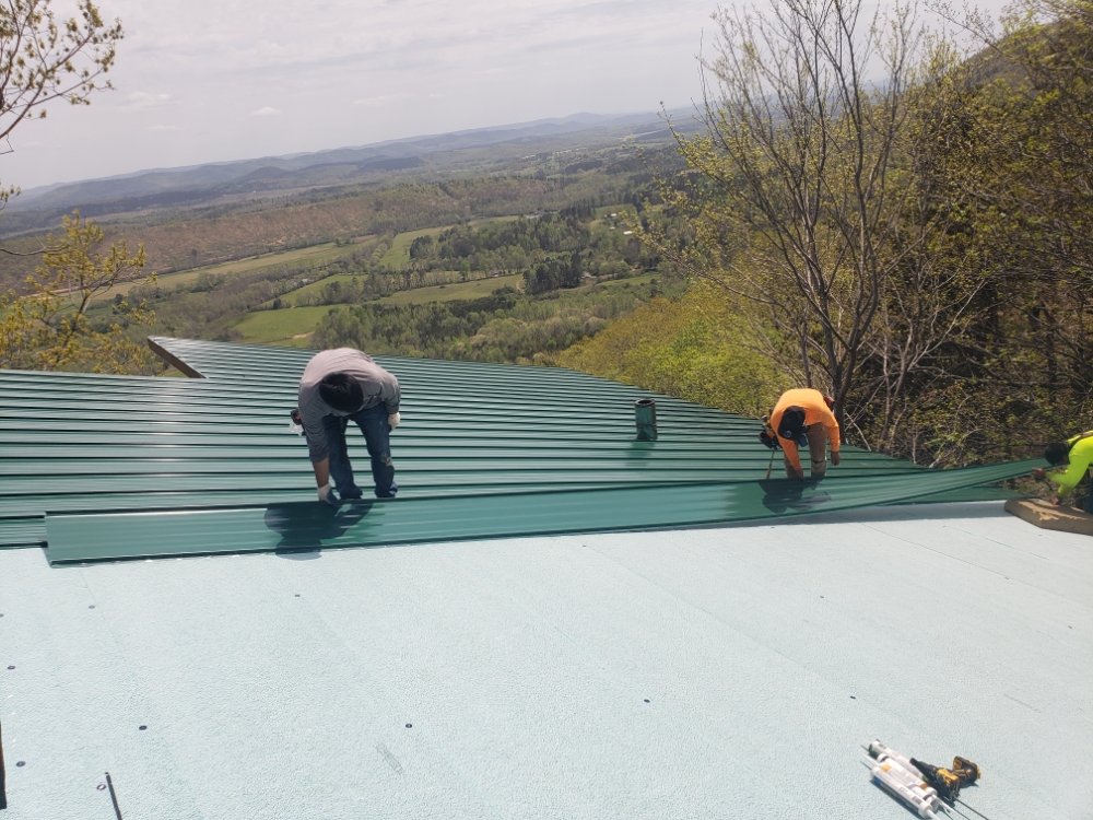 Slide of Real Deal Roofing