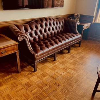 Ancor Professional Upholstery - Our Upholstery Shop in Chicago expertly hand-tufted the leather and meticulously applied each decorative nail head individually - Furniture Reupholstery Near Me - Chicago, Illinois