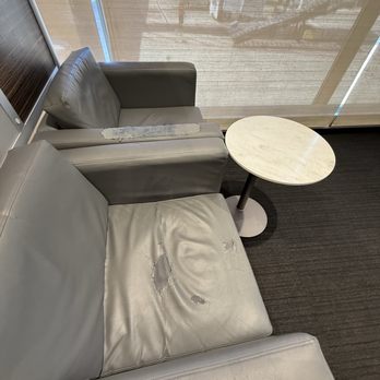 The Lounge - Worn seating - Airport Lounges Near Me - Boston, Massachusetts The Lounge - Worn seating - Airport Lounges Near Me - Boston, Massachusetts