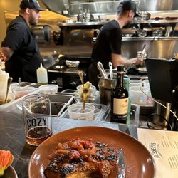 The Cozy Taberna - Seared to perfection! Pork chop shared by my husband and me. Great size portion. Melted in our mouths!