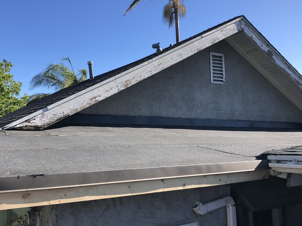 Slide of Kennedy Roofing