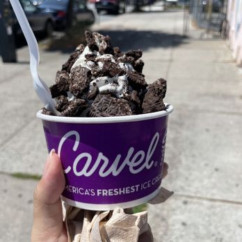Carvel - a hand holding a cup of ice cream - Ice Cream & Frozen Yogurt Near Me - Brooklyn, New York Carvel - a hand holding a cup of ice cream - Ice Cream & Frozen Yogurt Near Me - Brooklyn, New York
