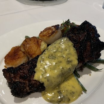Flying Fish - Char-crusted New York Strip with added-on scallops - Seafood Near Me - Orlando, Florida Flying Fish - Char-crusted New York Strip with added-on scallops - Seafood Near Me - Orlando, Florida