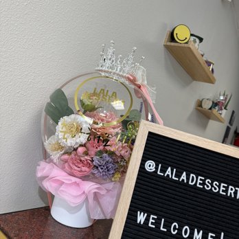 La La Dessert - a welcome sign and flowers - Desserts Near Me - Buena Park, California La La Dessert - a welcome sign and flowers - Desserts Near Me - Buena Park, California