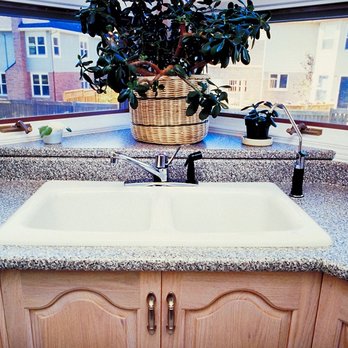De Leon Kitchen and Bath Remodeling and Construction - a sink and window - Flooring Near Me De Leon Kitchen and Bath Remodeling and Construction - a sink and window - Flooring Near Me