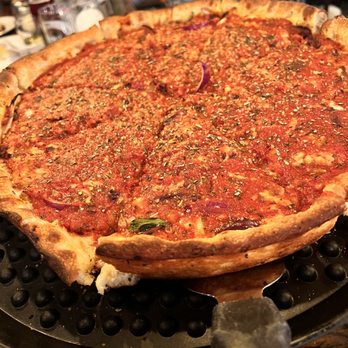 Walter's303 Pizzeria - Uptown - a deep dish pizza on a pizza pan - Pizza Near Me - Denver, Colorado Walter's303 Pizzeria - Uptown - a deep dish pizza on a pizza pan - Pizza Near Me - Denver, Colorado