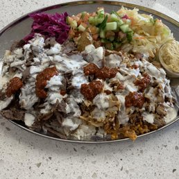 mixed beef & chicken plate on rice & couscous mixed beef & chicken plate on rice & couscous