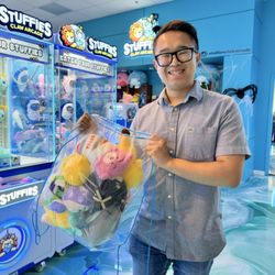 Stuffies Claw Arcade - The stuffed bag of prizes I won! Won 13 prizes with just $20 in tokens!