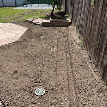 Go green Lawn & Landscape - a fence and a drain - Lawn Services Near Me Go green Lawn & Landscape - a fence and a drain - Lawn Services Near Me