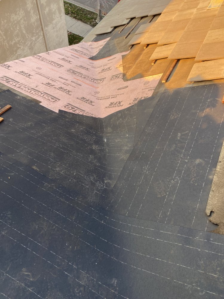 Slide of Octavio Sajuan Roofing