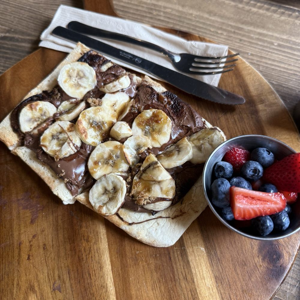 Lola's Cafe - Banana Nutella Flatbread - Coffee & Tea Near Me - Ladera Ranch, California Lola's Cafe - Banana Nutella Flatbread - Coffee & Tea Near Me - Ladera Ranch, California