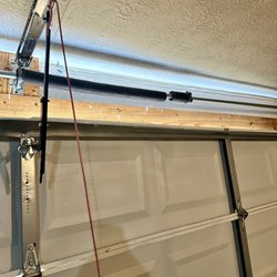 Norm's Garage Door Service - Broken spring