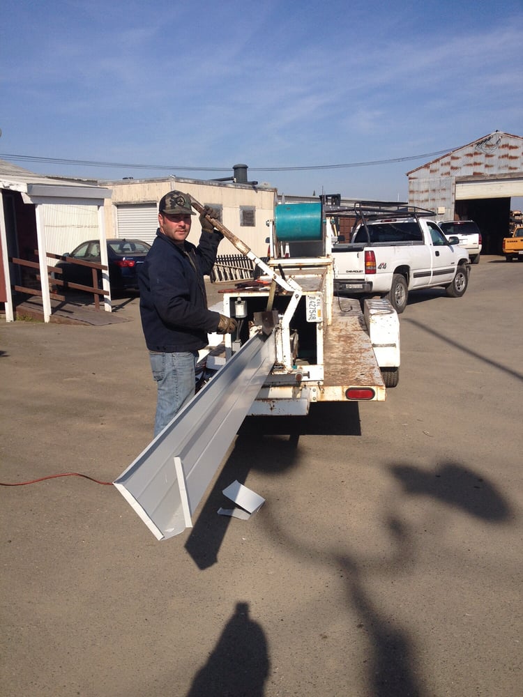 Slide of River City Roofing