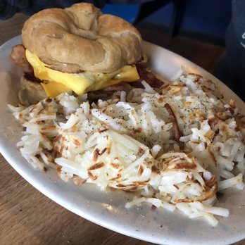 Tolly-Ho - Bacon egg and cheese Croissant, hash browns - American Near Me - Lexington, Kentucky
