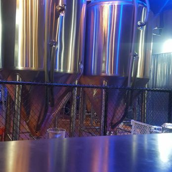 Lead Dog Brewing - Stainless steel fermenter right in front of us at the bar. Really cool. - Breweries Near Me - Reno, Nevada