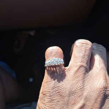Kevin Jewelers - The ring that was resold that had an Engraving that was scratched off that made the band thinner and part of the engraving was still there - Jewelry Near Me - Montclair, California Kevin Jewelers - The ring that was resold that had an Engraving that was scratched off that made the band thinner and part of the engraving was still there - Jewelry Near Me - Montclair, California