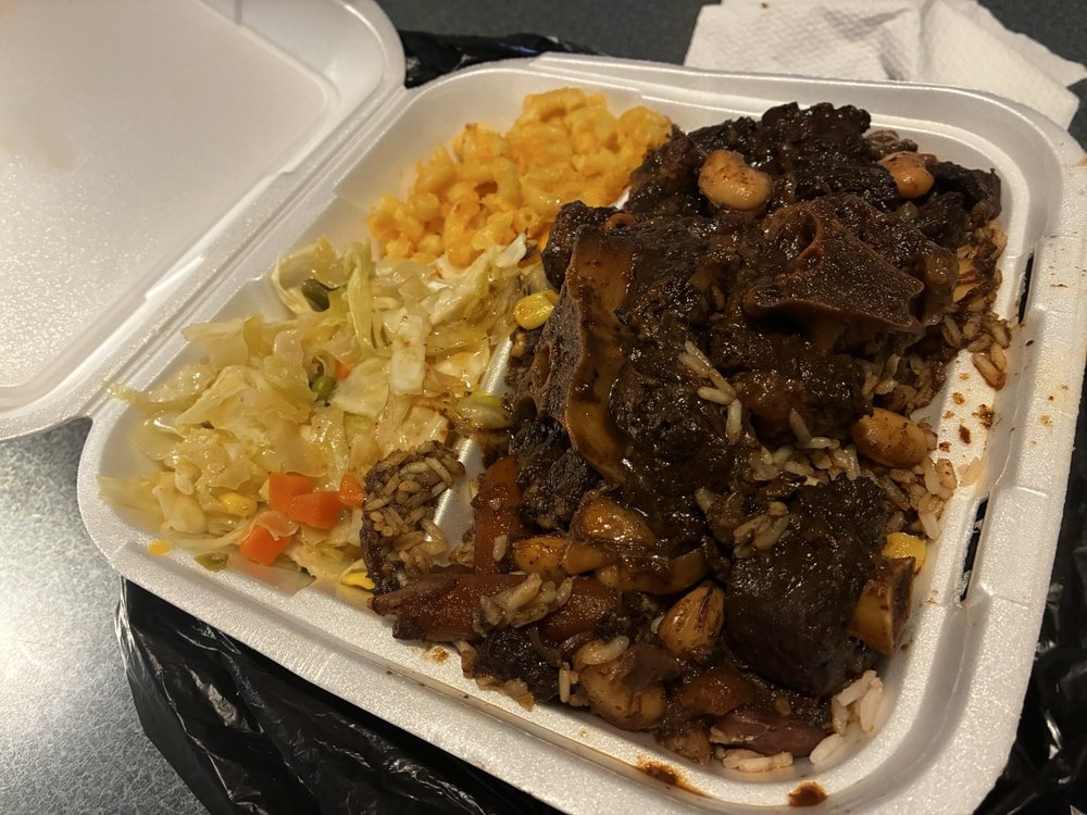 Mamee's Kitchen Authentic Jamaican Cuisine And Catering Logo