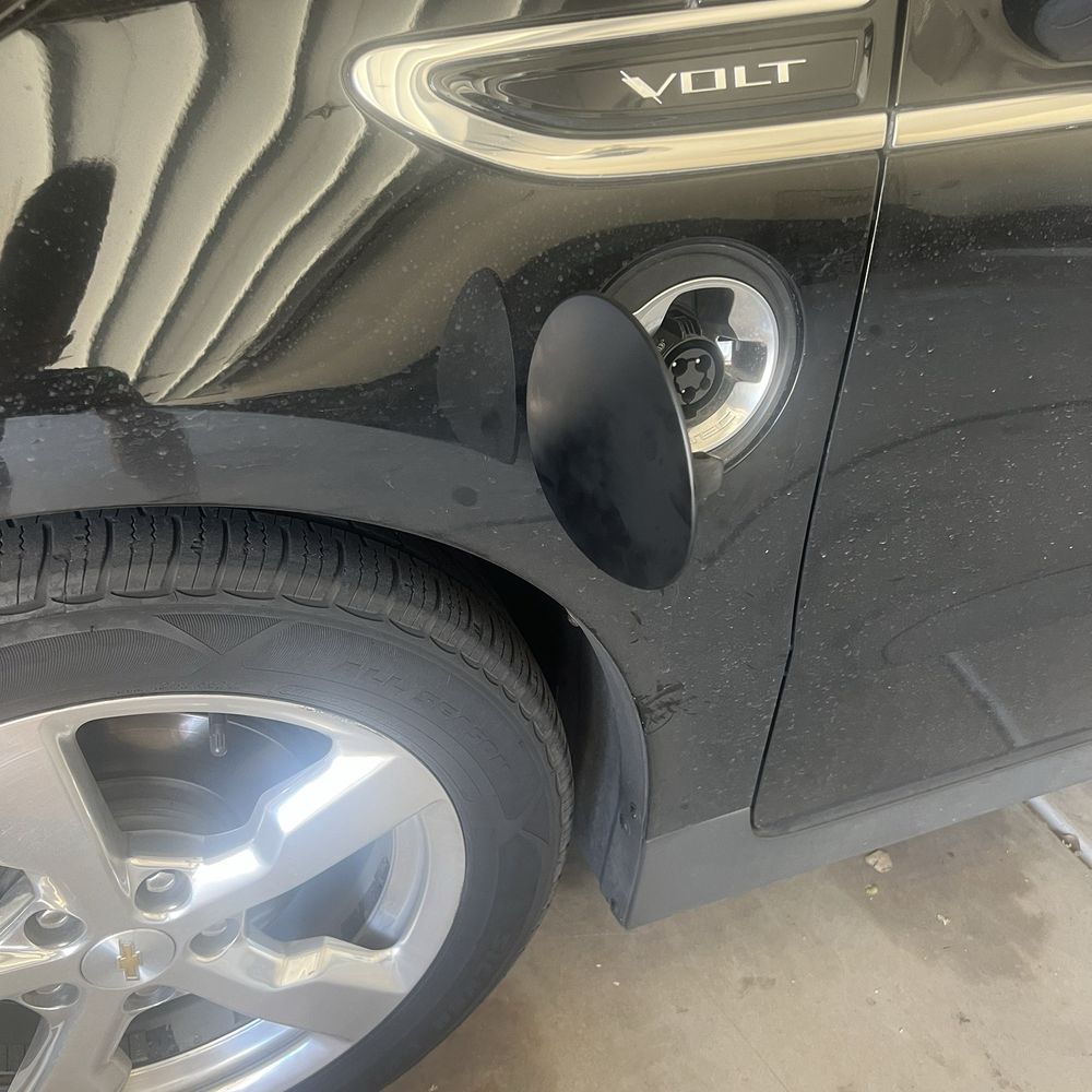 Electric charging port cover I found and fixed myself after they broke it Electric charging port cover I found and fixed myself after they broke it