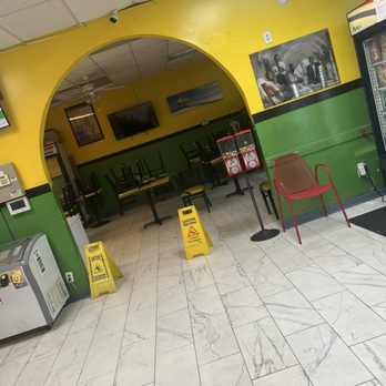 D&M Jamaican Cuisine - Over there chair and table turn upside down - Caribbean Near Me - Stone Mountain, Georgia D&M Jamaican Cuisine - Over there chair and table turn upside down - Caribbean Near Me - Stone Mountain, Georgia
