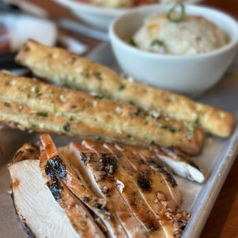 Stonefire Grill - Lunch 5 oz chicken breast with mash potatoes and two breadsticks. - American Near Me - Valencia, California Stonefire Grill - Lunch 5 oz chicken breast with mash potatoes and two breadsticks. - American Near Me - Valencia, California