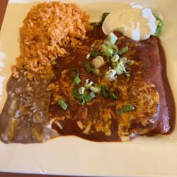 Don Jose's - Refried beans, rice, two ground beef, and one birra, enchiladas. It was only one dollar more to get the three enchiladas instead of two.
