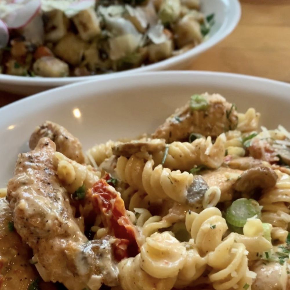 Fusilli with sun dried tomato and chicken (front), Gnocchi (back). Fusilli with sun dried tomato and chicken (front), Gnocchi (back).