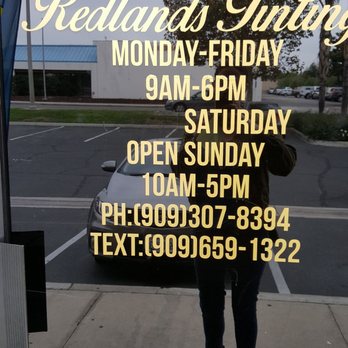 Redlands Tinting - Signs stating time when open but doors locked. - Car Window Tinting Near Me - Redlands, California