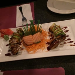 Brown Dragon maki and sake sashimi Brown Dragon maki and sake sashimi