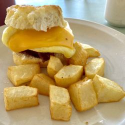 The Dutch Cupboard - Bacon, egg, & cheese biscuit, with home fries