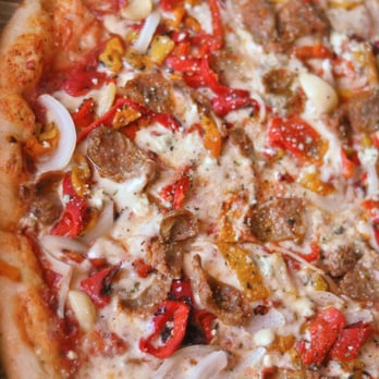 Mezza Luna Pizzeria - The Boot - Pizza Near Me - Eugene, Oregon