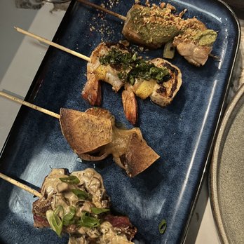 Space Cowboy - Surf and Turf - shrimp, chicken, scallops and steak - Cocktail Bars Near Me - Austin, Texas
